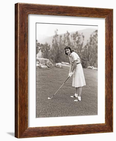 Woman in White Gloves Playing Golf-null-Framed Photo