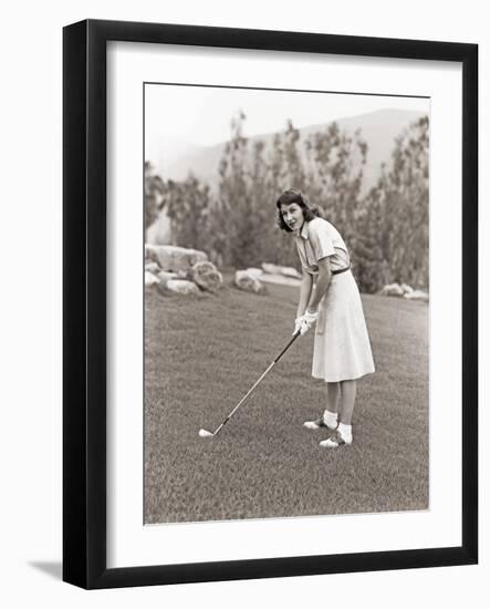 Woman in White Gloves Playing Golf-null-Framed Photo