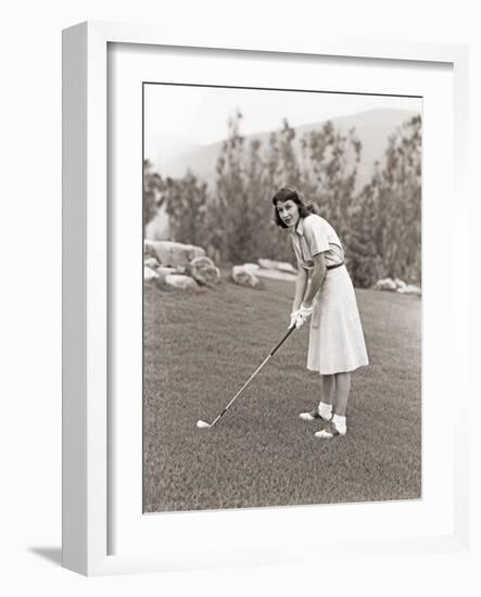 Woman in White Gloves Playing Golf-null-Framed Photo