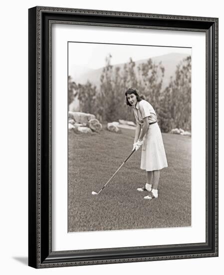 Woman in White Gloves Playing Golf-null-Framed Photo