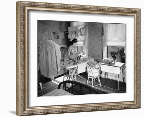 Woman Ironing in Slum Home-William C^ Shrout-Framed Photographic Print