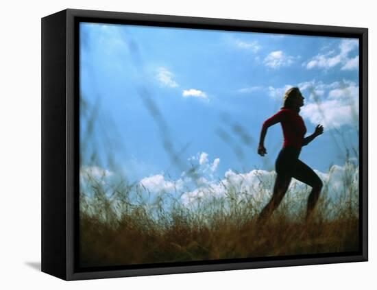 Woman Jogging-Cristina-Framed Premier Image Canvas