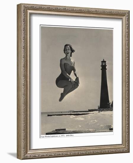 Woman Jumping in Front of Cape Florida Lighthouse, C.1975-null-Framed Giclee Print