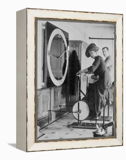 Woman Keeping Fit in the Titanic's Gymnasium-null-Framed Premier Image Canvas