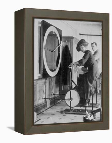 Woman Keeping Fit in the Titanic's Gymnasium-null-Framed Premier Image Canvas