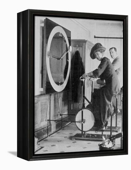 Woman Keeping Fit in the Titanic's Gymnasium-null-Framed Premier Image Canvas