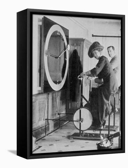 Woman Keeping Fit in the Titanic's Gymnasium-null-Framed Premier Image Canvas