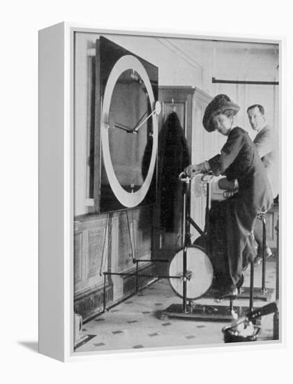 Woman Keeping Fit in the Titanic's Gymnasium-null-Framed Premier Image Canvas