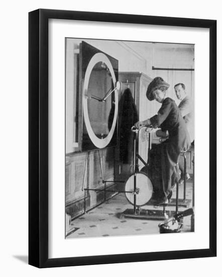 Woman Keeping Fit in the Titanic's Gymnasium--Framed Photographic Print