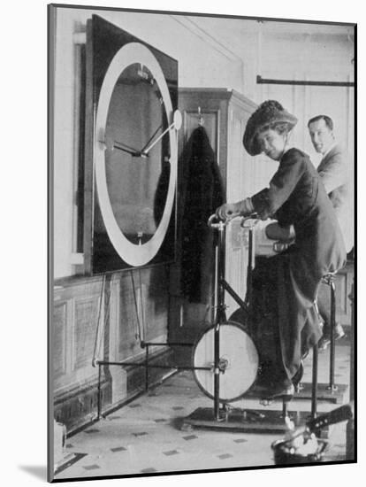 Woman Keeping Fit in the Titanic's Gymnasium-null-Mounted Photographic Print