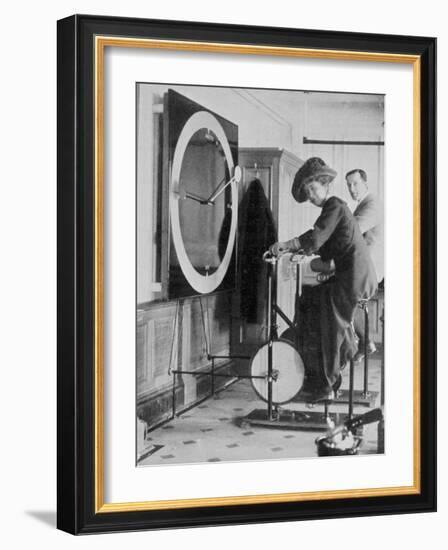 Woman Keeping Fit in the Titanic's Gymnasium-null-Framed Photographic Print