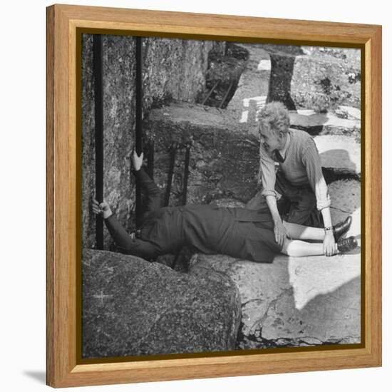 Woman Kissing the Blarney Stone-Hans Wild-Framed Premier Image Canvas