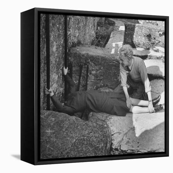 Woman Kissing the Blarney Stone-Hans Wild-Framed Premier Image Canvas