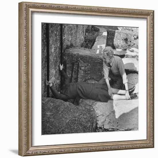 Woman Kissing the Blarney Stone-Hans Wild-Framed Photographic Print