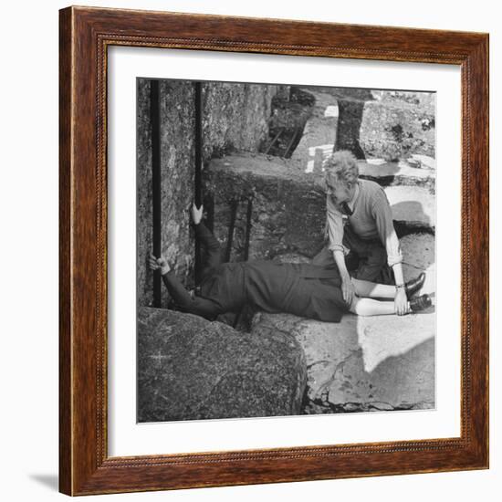 Woman Kissing the Blarney Stone-Hans Wild-Framed Photographic Print