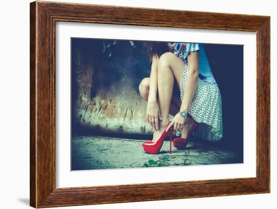 Woman Legs In Red High Heel Shoes And Short Skirt Outdoor Shot Against Old Metal Door-coka-Framed Art Print