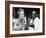 Woman Lighting a Cigarette from a Candle Held by a Waiter at the Piedmont Ball-Paul Schutzer-Framed Photographic Print