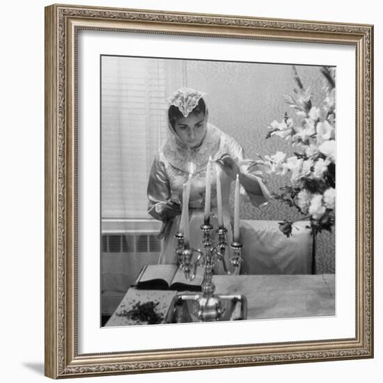 Woman Lighting Candles During Hasidic Jewish Wedding Ceremony-Yale Joel-Framed Photographic Print