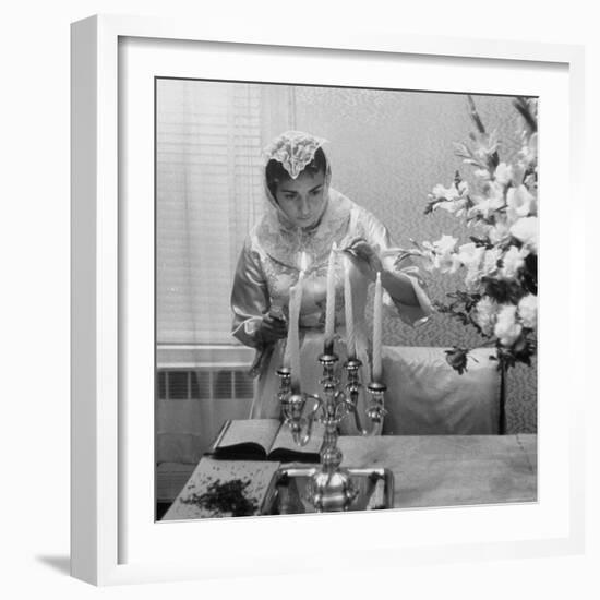 Woman Lighting Candles During Hasidic Jewish Wedding Ceremony-Yale Joel-Framed Photographic Print