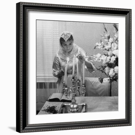 Woman Lighting Candles During Hasidic Jewish Wedding Ceremony-Yale Joel-Framed Photographic Print