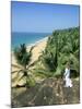 Woman Looking Over Coconut Palms to the Beach, Kovalam, Kerala State, India-Gavin Hellier-Mounted Photographic Print