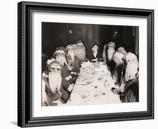 Woman Lunching with Twelve Santa Clauses-null-Framed Photo