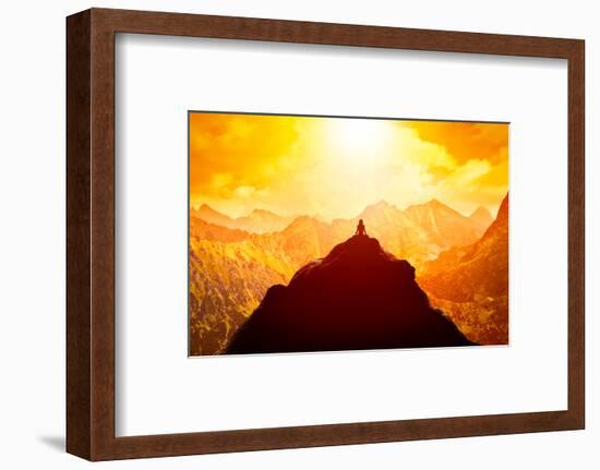 Woman Meditating in Sitting Yoga Position on the Top of a Mountains above Clouds at Sunset. Zen, Me-null-Framed Photographic Print