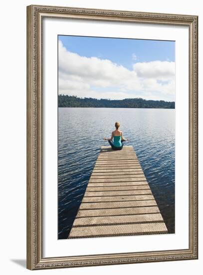 Woman Meditating on a Jetty, Lake Ianthe, West Coast, South Island, New Zealand, Pacific-Matthew Williams-Ellis-Framed Photographic Print