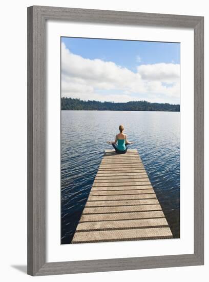 Woman Meditating on a Jetty, Lake Ianthe, West Coast, South Island, New Zealand, Pacific-Matthew Williams-Ellis-Framed Photographic Print