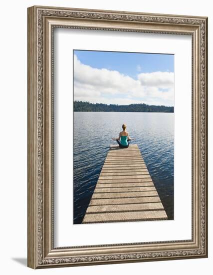 Woman Meditating on a Jetty, Lake Ianthe, West Coast, South Island, New Zealand, Pacific-Matthew Williams-Ellis-Framed Photographic Print