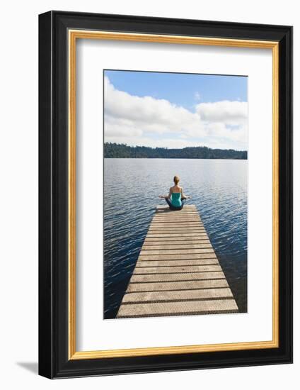 Woman Meditating on a Jetty, Lake Ianthe, West Coast, South Island, New Zealand, Pacific-Matthew Williams-Ellis-Framed Photographic Print