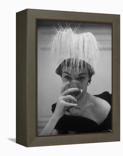 Woman Modeling White Satin Hat, with White Glycerin Feathers to Flatter Low Draped Neckline-Nina Leen-Framed Premier Image Canvas