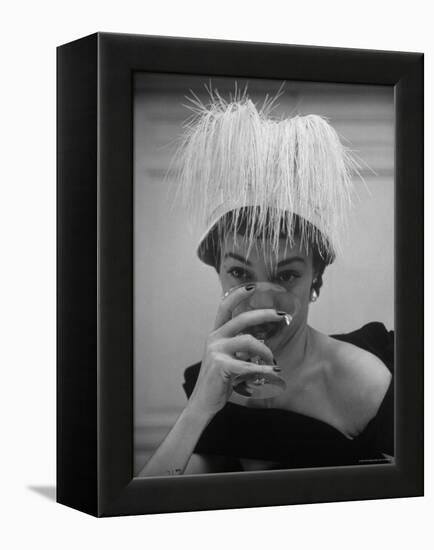 Woman Modeling White Satin Hat, with White Glycerin Feathers to Flatter Low Draped Neckline-Nina Leen-Framed Premier Image Canvas