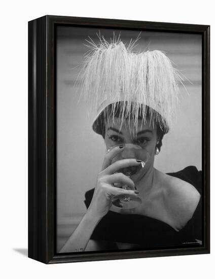 Woman Modeling White Satin Hat, with White Glycerin Feathers to Flatter Low Draped Neckline-Nina Leen-Framed Premier Image Canvas