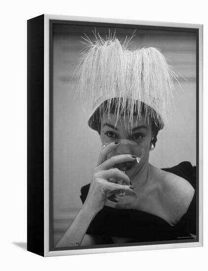 Woman Modeling White Satin Hat, with White Glycerin Feathers to Flatter Low Draped Neckline-Nina Leen-Framed Premier Image Canvas