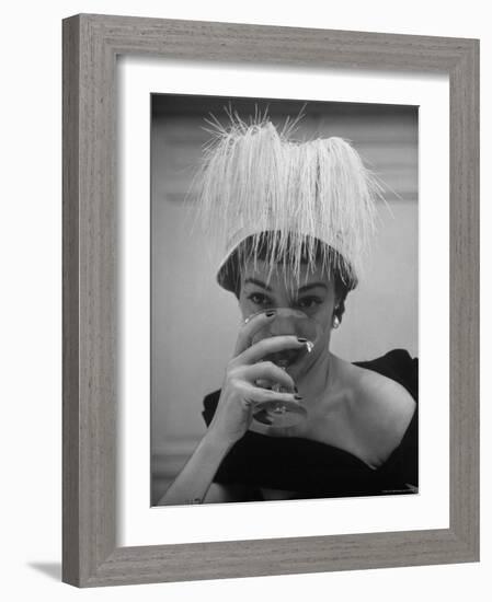 Woman Modeling White Satin Hat, with White Glycerin Feathers to Flatter Low Draped Neckline-Nina Leen-Framed Photographic Print