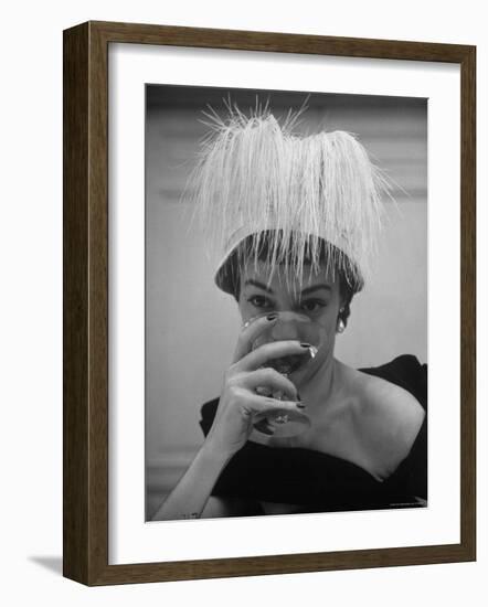 Woman Modeling White Satin Hat, with White Glycerin Feathers to Flatter Low Draped Neckline-Nina Leen-Framed Photographic Print