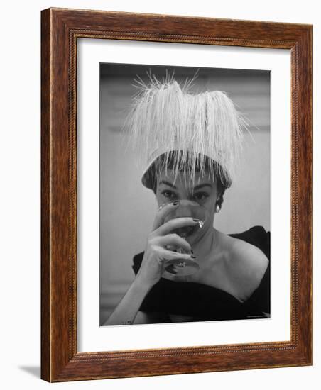 Woman Modeling White Satin Hat, with White Glycerin Feathers to Flatter Low Draped Neckline-Nina Leen-Framed Photographic Print