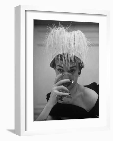 Woman Modeling White Satin Hat, with White Glycerin Feathers to Flatter Low Draped Neckline-Nina Leen-Framed Photographic Print