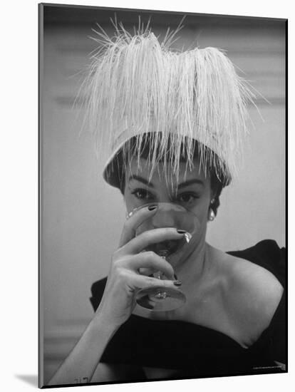 Woman Modeling White Satin Hat, with White Glycerin Feathers to Flatter Low Draped Neckline-Nina Leen-Mounted Photographic Print