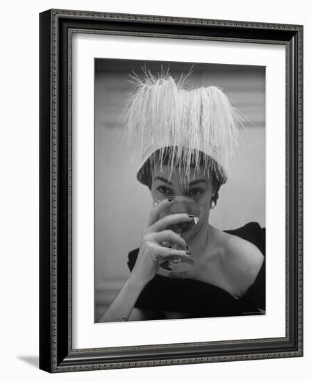 Woman Modeling White Satin Hat, with White Glycerin Feathers to Flatter Low Draped Neckline-Nina Leen-Framed Photographic Print