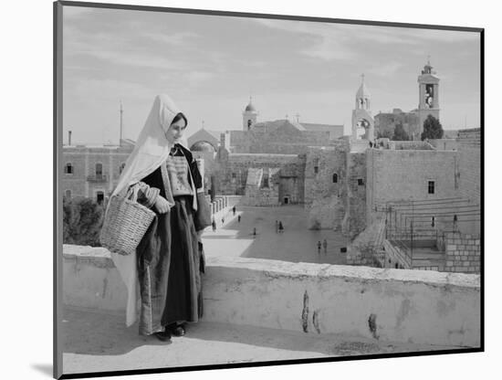 Woman on Roof Facing Church of the Nativity Photograph - Bethlehem, Palestine-Lantern Press-Mounted Art Print