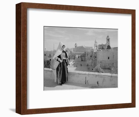 Woman on Roof Facing Church of the Nativity Photograph - Bethlehem, Palestine-Lantern Press-Framed Art Print