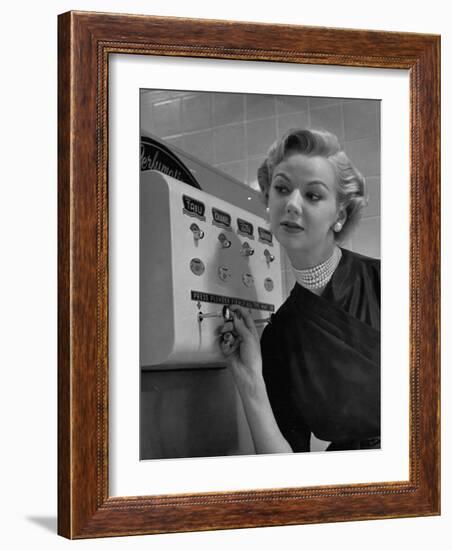 Woman Operating Coin-Operated Perfume Vending Machine-Nina Leen-Framed Photographic Print