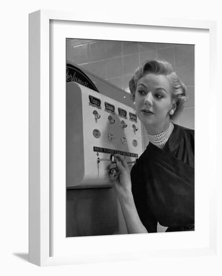 Woman Operating Coin-Operated Perfume Vending Machine-Nina Leen-Framed Photographic Print