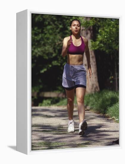 Woman Out on a Fitness Walk-Paul Sutton-Framed Premier Image Canvas