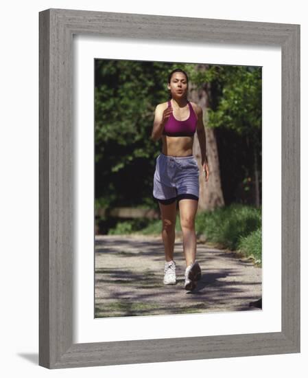 Woman Out on a Fitness Walk-Paul Sutton-Framed Photographic Print