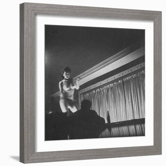 Woman Performing a Strip Tease Dance-null-Framed Photographic Print