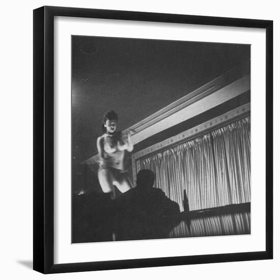 Woman Performing a Strip Tease Dance-null-Framed Photographic Print