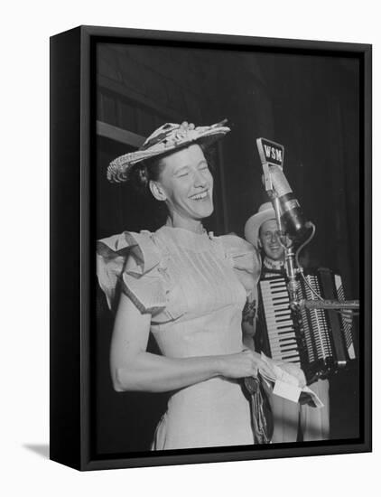 Woman Performing Onstage at the Grand Ole Opry-Ed Clark-Framed Premier Image Canvas